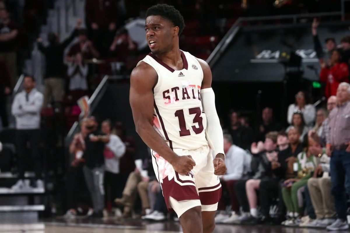 Feb 17, 2024; Starkville, Mississippi, USA; Mississippi State Bulldogs guard Josh Hubbard (13) reacts after a three point basket against the Arkansas Razorbacks during the second half at Humphrey Coliseum.