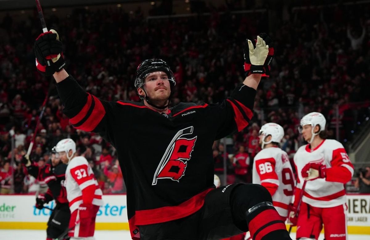 Jan 19, 2024; Raleigh, North Carolina, USA; Carolina Hurricanes right wing Andrei Svechnikov (37) scores a goal against the Detroit Red Wings during the third period at PNC Arena.