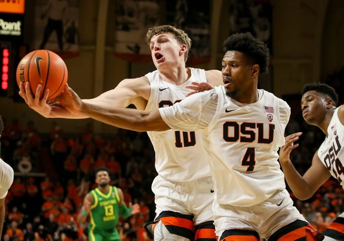 Oregon State's Tyler Bilodeau and Dexter Akanno rebound the ball as the Oregon Ducks take on the Oregon State Beavers at Gill Coliseum Saturday, Feb. 25, 2023, in Corvallis, Ore.

Ncaa Basketball Oregon At Oregon State Mbb Oregon At Oregon State
