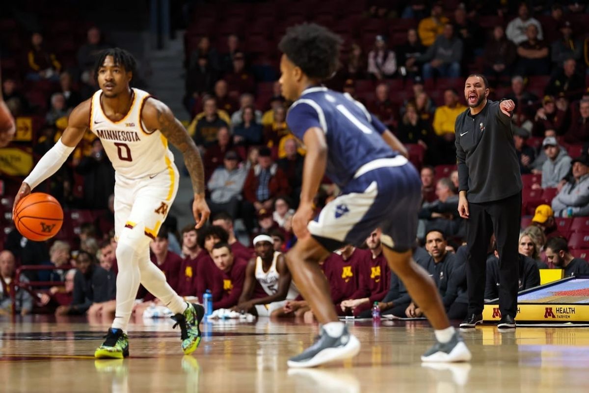 Nov 30, 2023; Minneapolis, Minnesota, USA; Minnesota Golden Gophers head coach Ben Johnson calls a play during the first half against the New Orleans Privateers at Williams Arena.