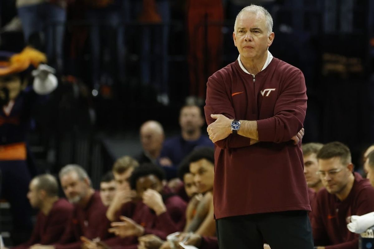 Jan 17, 2024; Charlottesville, Virginia, USA; Virginia Tech Hokies head coach Mike Young looks on from the bench against the Virginia Cavaliers in the second half at John Paul Jones Arena.