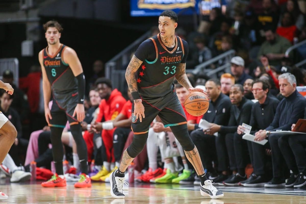 Jan 13, 2024; Atlanta, Georgia, USA; Washington Wizards forward Kyle Kuzma (33) dribbles against the Atlanta Hawks in the second quarter at State Farm Arena.