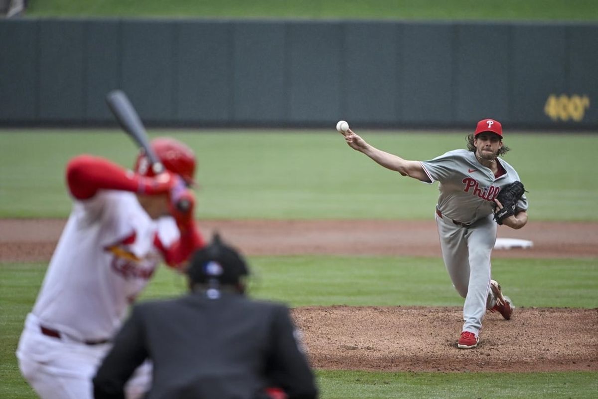 Apr 10, 2024; St. Louis, Missouri, USA;  Philadelphia Phillies starting pitcher Aaron Nola (27) pitches against St. Louis Cardinals designated hitter Willson Contreras (40) during the third inning at Busch Stadium.