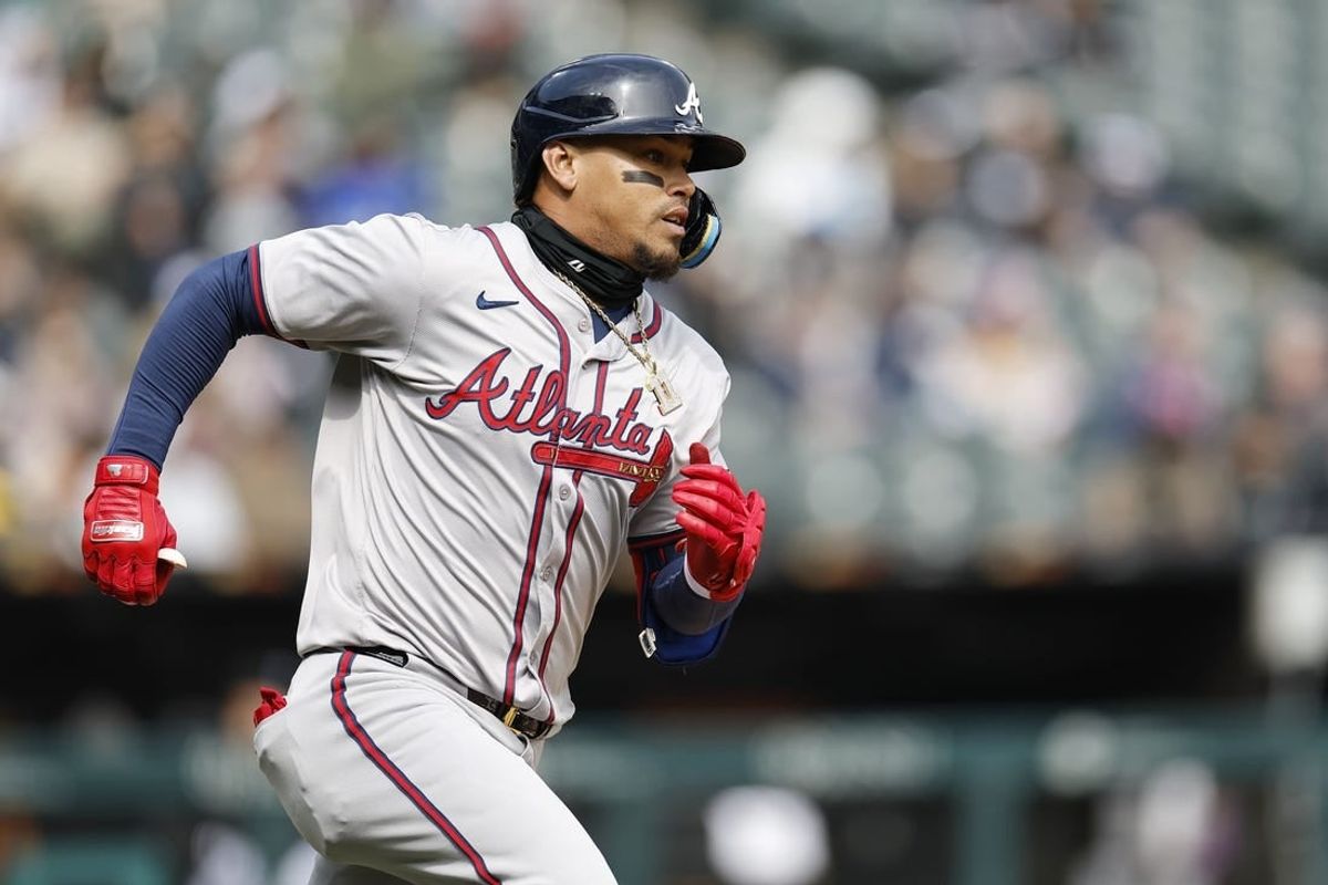 Apr 1, 2024; Chicago, Illinois, USA; Atlanta Braves shortstop Orlando Arcia (11) runs to second base after hitting a two-run double against the Chicago White Sox during the fourth inning at Guaranteed Rate Field.