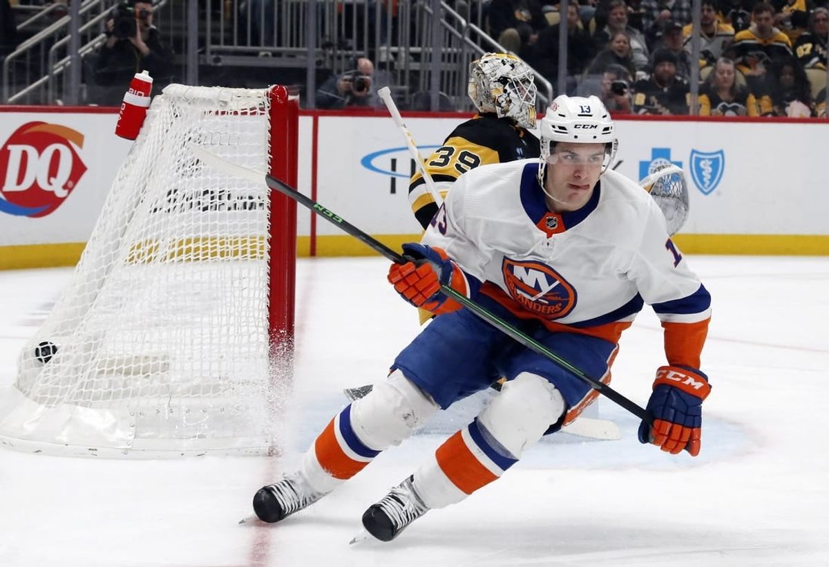 Feb 20, 2024; Pittsburgh, Pennsylvania, USA; New York Islanders center Mathew Barzal (13) reacts after scoring a goal against Pittsburgh Penguins goaltender Alex Nedeljkovic (39) during the second period at PPG Paints Arena.