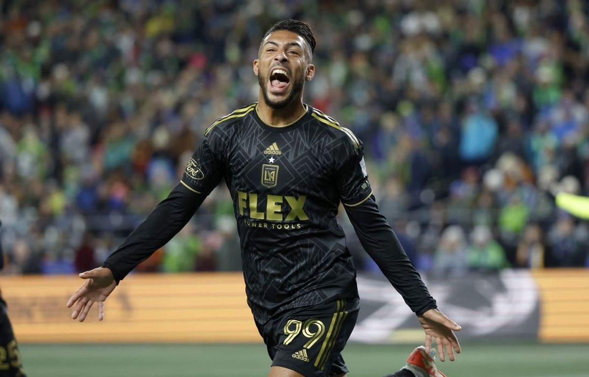 Nov 26, 2023; Seattle, Washington, USA; Los Angeles FC forward Denis Bouanga (99) reacts after scoring during the first half of a MLS Cup Western Conference Semifinal match against the Seattle Sounders at Lumen Field.