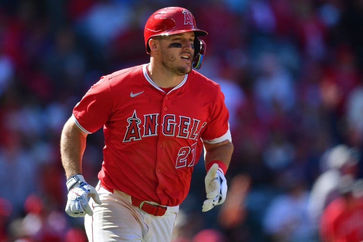Apr 7, 2024; Anaheim, California, USA;  Los Angeles Angels center fielder Mike Trout (27) runs after hitting a solo home run against the Boston Red Sox during the eighth inning at Angel Stadium.