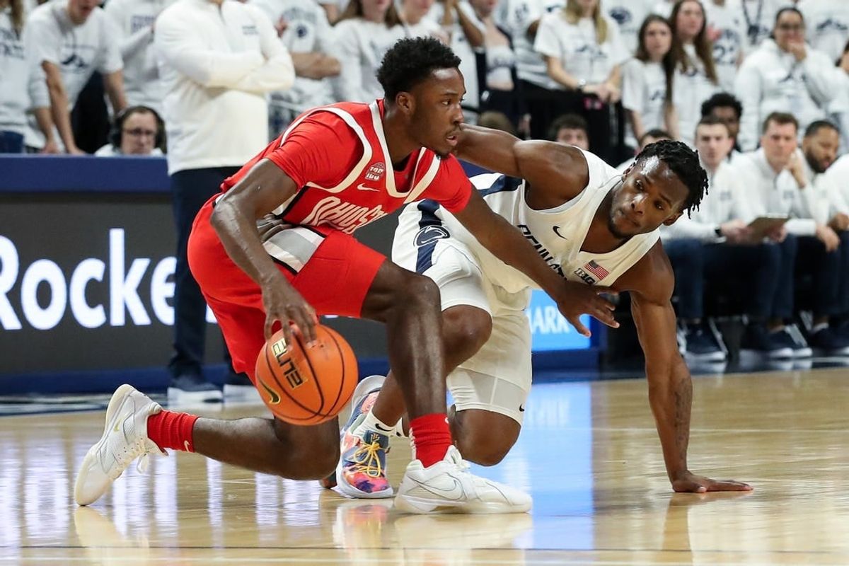 Dec 9, 2023; University Park, Pennsylvania, USA; Ohio State Buckeyes guard Dale Bonner (4) dribbles the ball as Penn State Nittany Lions guard Kanye Clary (0) defends during the first half at Bryce Jordan Center.