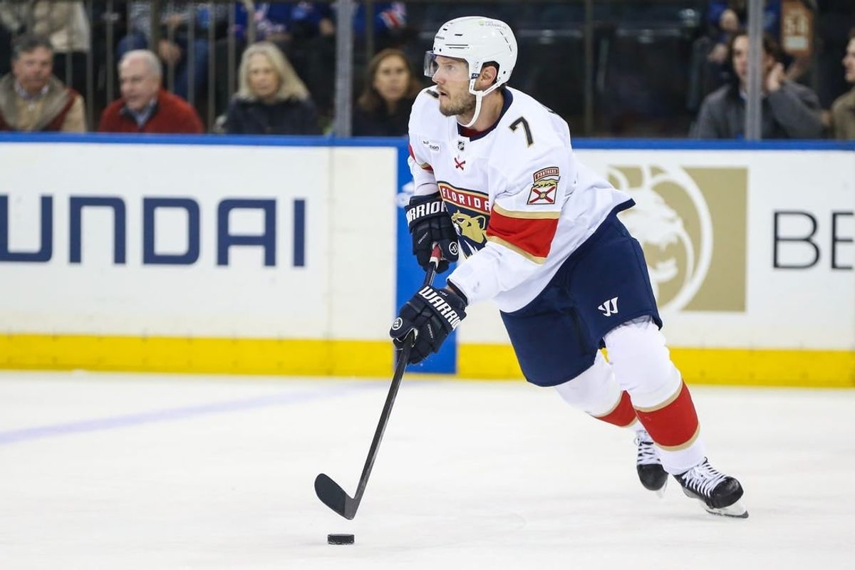 Mar 4, 2024; New York, New York, USA;  Florida Panthers defenseman Dmitry Kulikov (7) controls the puck in the first period against the New York Rangers at Madison Square Garden.