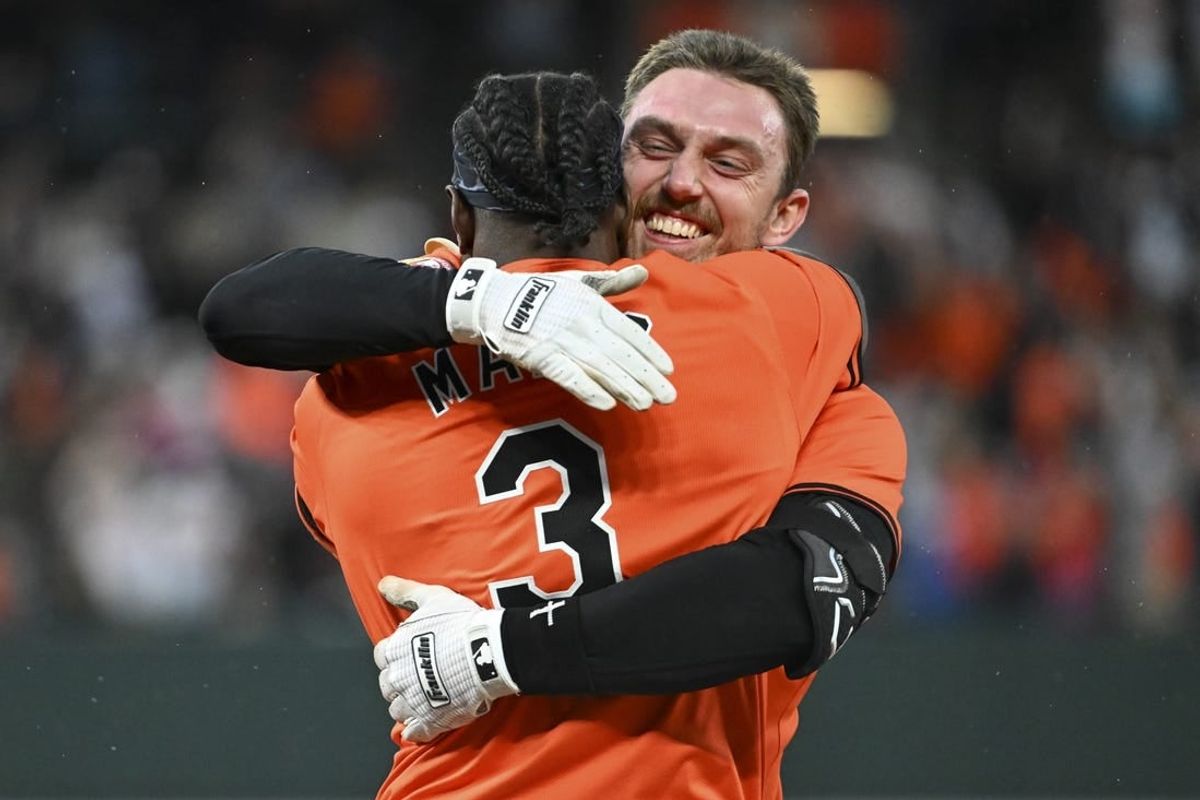 May 11, 2024; Baltimore, Maryland, USA;  Baltimore Orioles third baseman Jordan Westburg (11) celebrates with second baseman Jorge Mateo (3) after hitting a walk off single in the eleventh inning to defeat against the Arizona Diamondbacks at Oriole Park at Camden Yards.