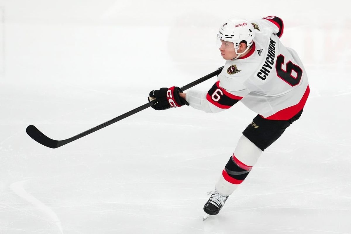 Dec 17, 2023; Las Vegas, Nevada, USA; Ottawa Senators defenseman Jakob Chychrun (6) shoots against the Vegas Golden Knights during the third period at T-Mobile Arena.