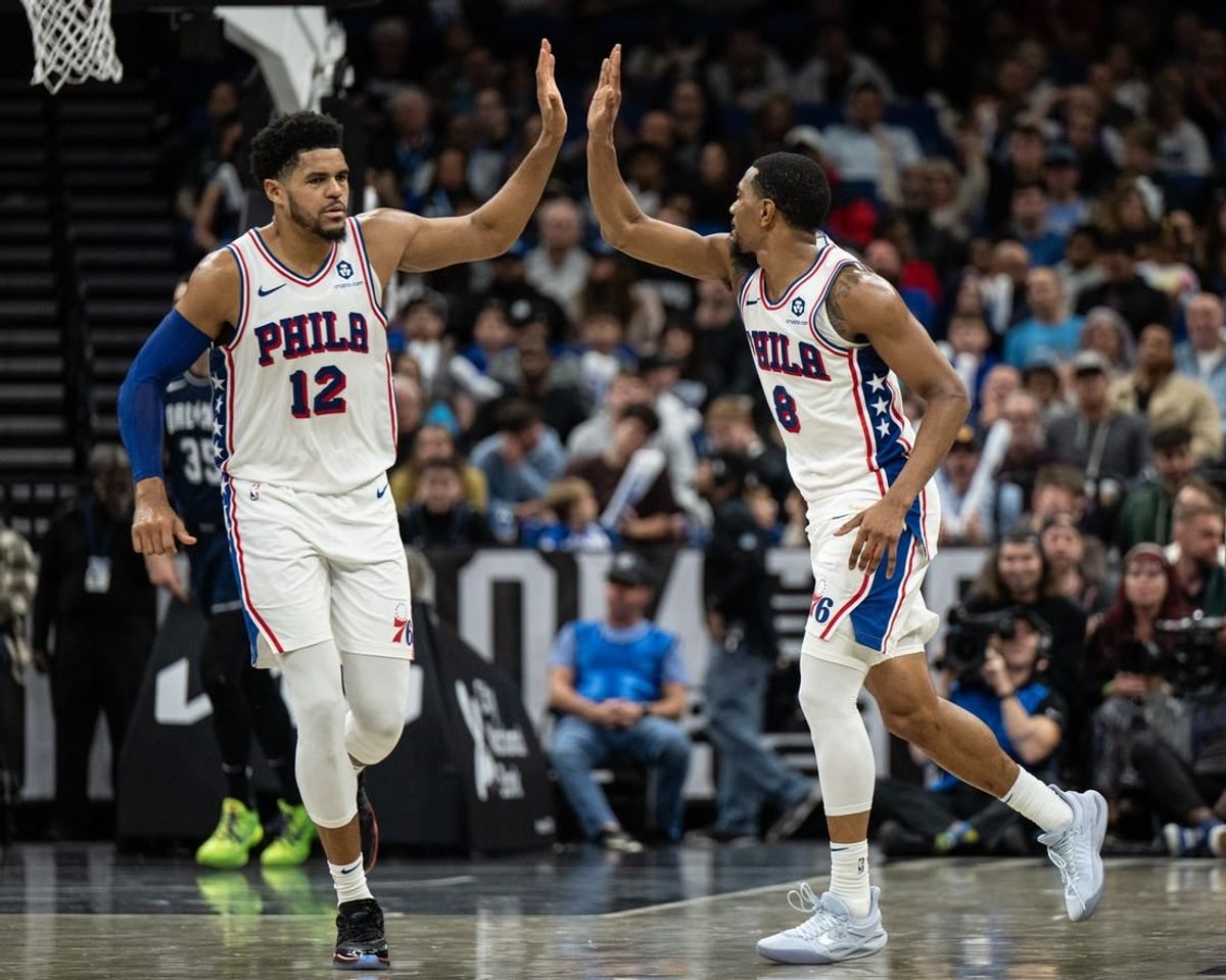 Dec 27, 2023; Orlando, Florida, USA; Philadelphia 76ers forward Tobias Harris (12) and small guard De'Anthony Melton (8) celebrate a turnover against the Orlando Magic in the fourth quarter at Kia Center.