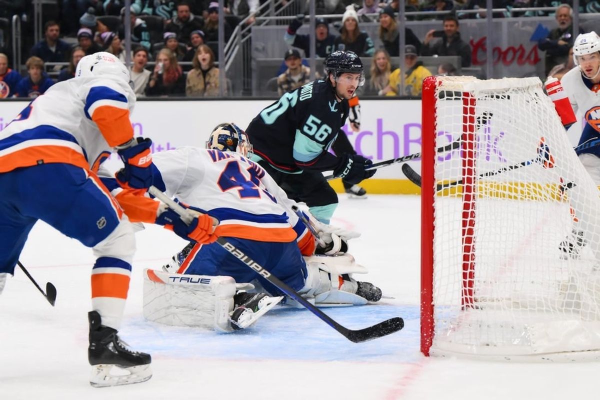 Nov 16, 2023; Seattle, Washington, USA; Seattle Kraken right wing Kailer Yamamoto (56) scores a goal past New York Islanders goaltender Semyon Varlamov (40) during the third period at Climate Pledge Arena.