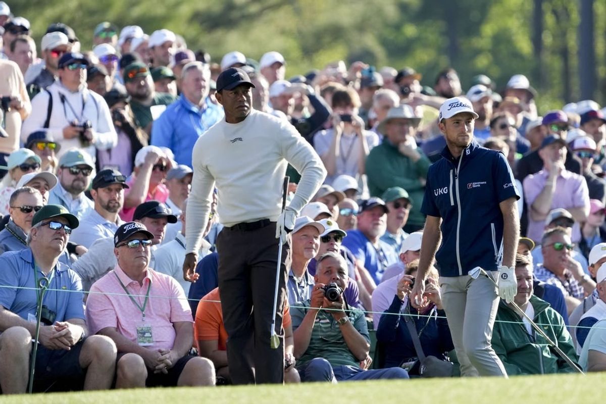 Apr 8, 2024; Augusta, Georgia, USA; Tiger Woods and Will Zalatoris on the 12th tee box during a practice round for the Masters Tournament golf tournament at Augusta National Golf Club.