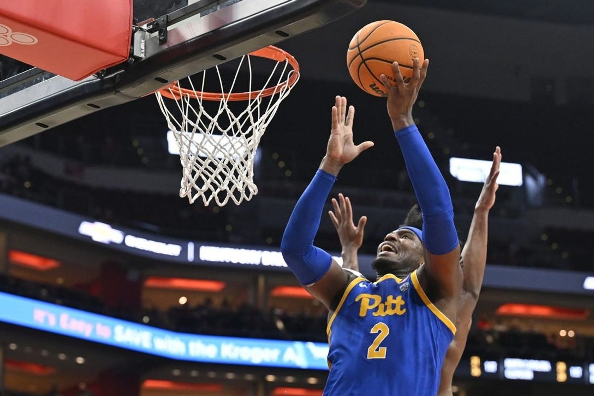 Jan 6, 2024; Louisville, Kentucky, USA; Pittsburgh Panthers forward Blake Hinson (2) shoots against the Louisville Cardinals during the first half at KFC Yum! Center.