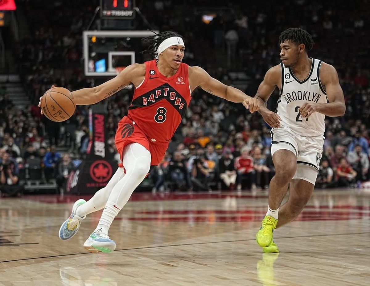 Nov 23, 2022; Toronto, Ontario, CAN; Toronto Raptors guard Ron Harper Jr. (8) drives to the net against \b25\during the second half at Scotiabank Arena.