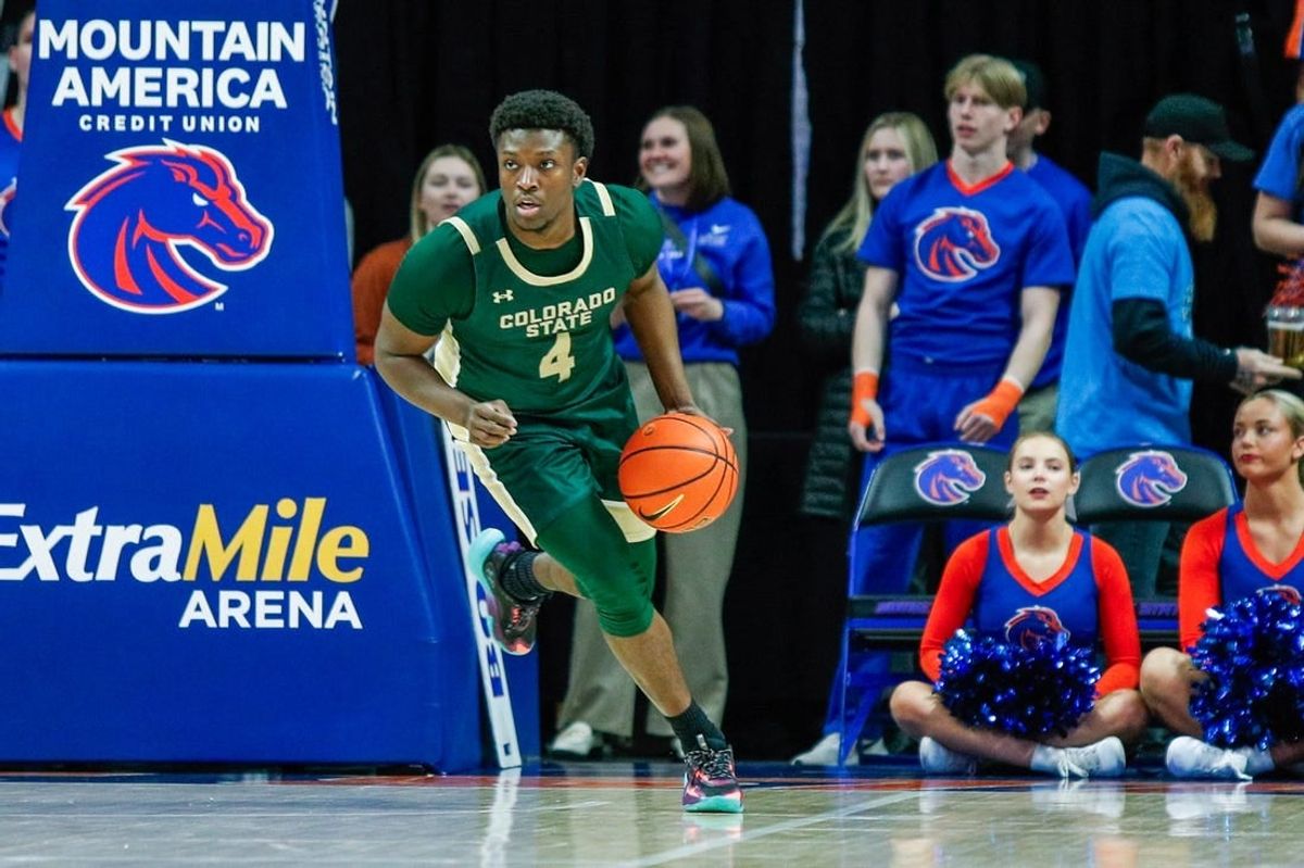 Jan 9, 2024; Boise, Idaho, USA; Colorado State Rams guard Isaiah Stevens (4) dribbles the ball up court during the first half against the Boise State Broncos at ExtraMile Arena.