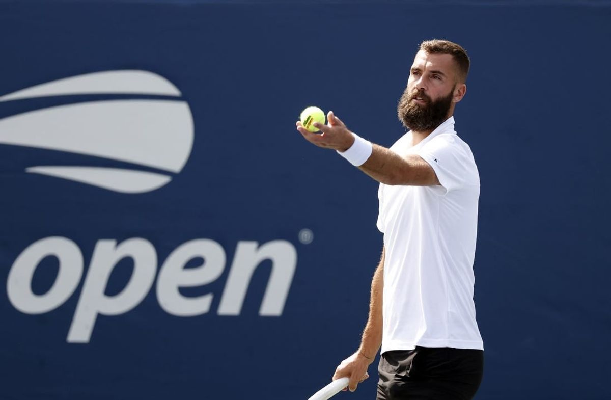 Aug 30, 2021; Flushing, NY, USA; Benoit Paire (FRA) serves to Dusan Lajovic (SRB) in a first round match on day one of the 2021 U.S. Open tennis tournament at USTA Billie King National Tennis Center.