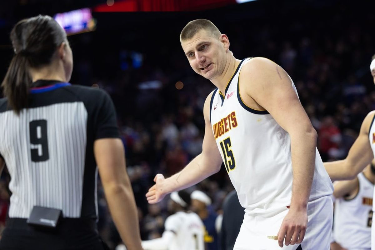 Jan 16, 2024; Philadelphia, Pennsylvania, USA; Denver Nuggets center Nikola Jokic (15) questions an officials call during the fourth quarter against the Philadelphia 76ers at Wells Fargo Center.