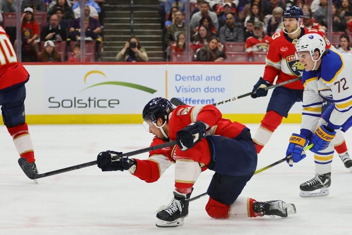 Apr 13, 2024; Sunrise, Florida, USA; Florida Panthers defenseman Brandon Montour (62) shoots the puck against the Buffalo Sabres during the second period at Amerant Bank Arena.