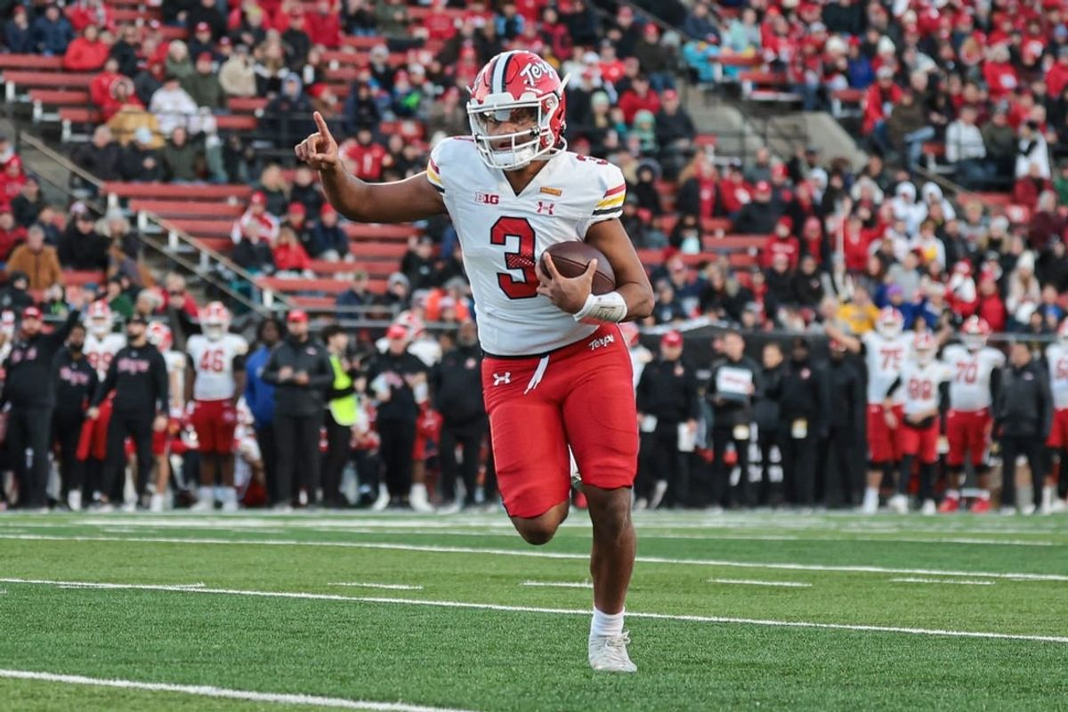 Nov 25, 2023; Piscataway, New Jersey, USA; Maryland Terrapins quarterback Taulia Tagovailoa (3) scores a rushing touchdown during the first half against the Rutgers Scarlet Knights at SHI Stadium.