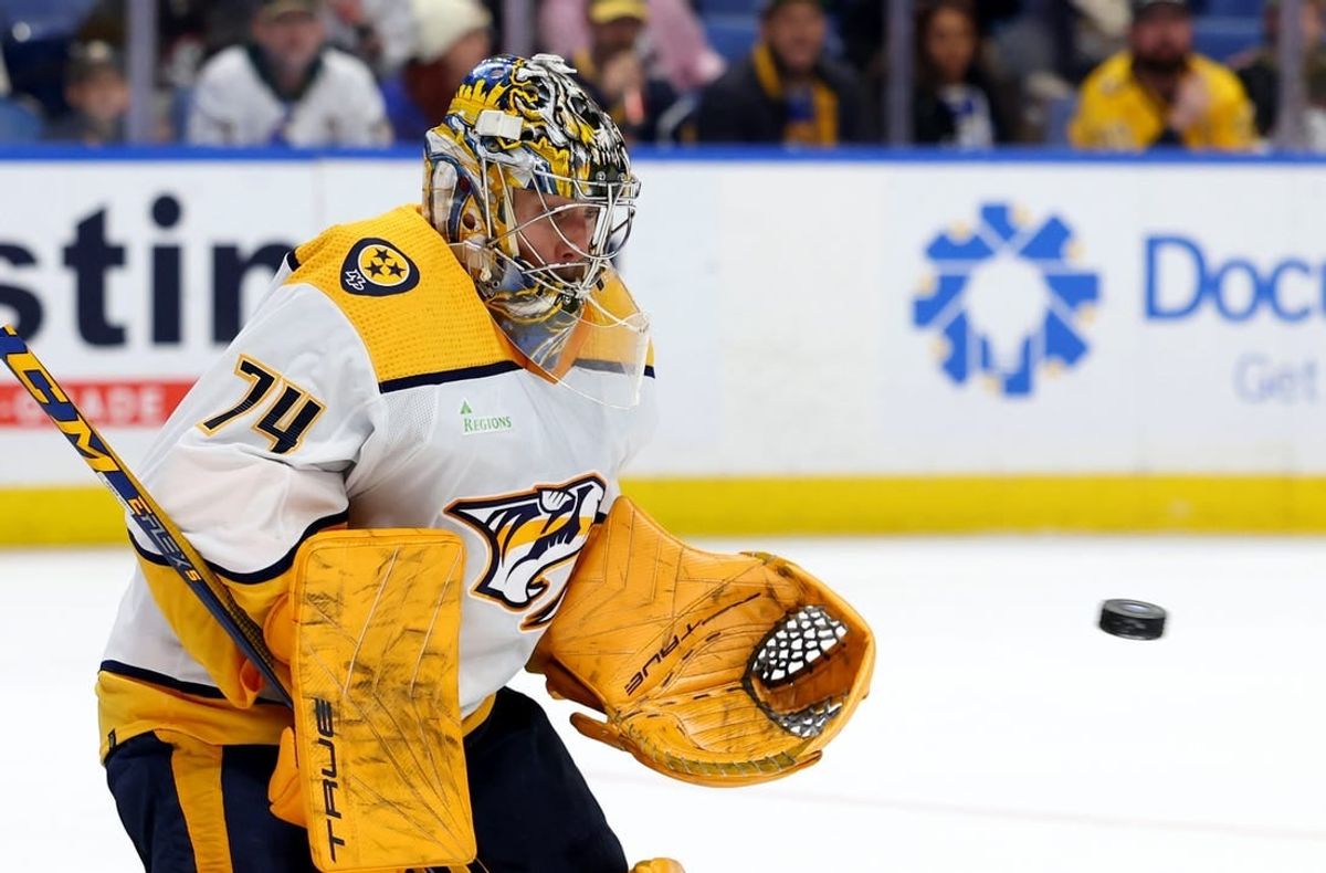 Dec 3, 2023; Buffalo, New York, USA;  Nashville Predators goaltender Juuse Saros (74) looks to make a save during the second period against the Buffalo Sabres at KeyBank Center.