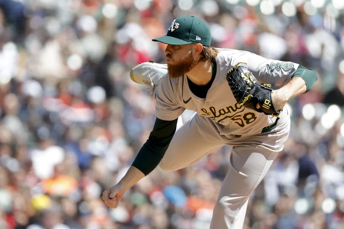 Apr 6, 2024; Detroit, Michigan, USA;  Oakland Athletics starting pitcher Paul Blackburn (58) throws against the Detroit Tigers in the first inning at Comerica Park.