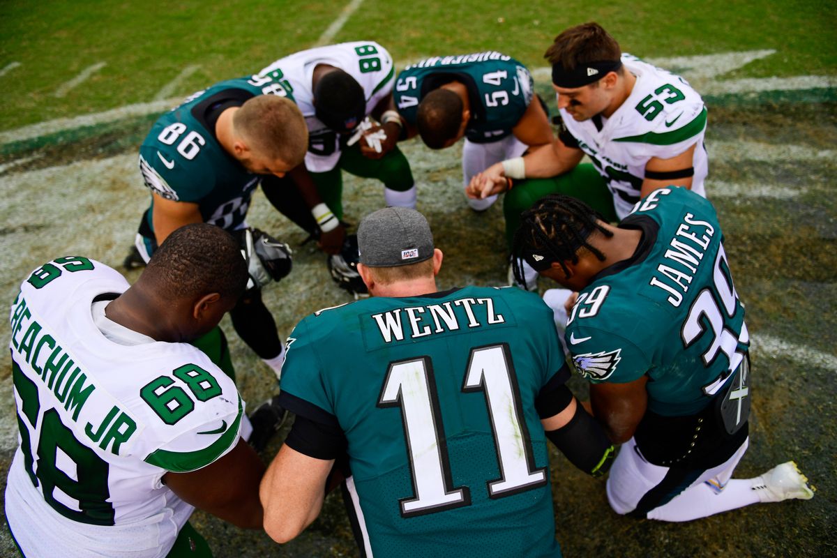 One of Carson Wentz’s former teammates, Chris Long, praised him for leading the conversation among white athletes to talk about racism.