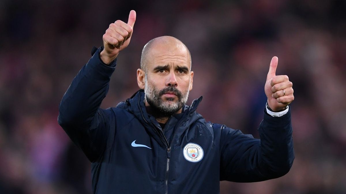 City manager Pep Guardiola trying to figure out God-knows-what with his thumbs before his squad was bounced from Champions League play by Lyon  on Saturday.