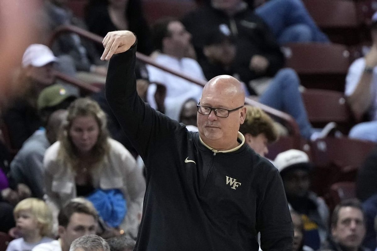Nov 16, 2023; Charleston, South Carolina, USA; Wake Forest Demon Deacons head coach Steve Forbes reacts to play on the court in the second half against the Utah Utes at TD Arena.