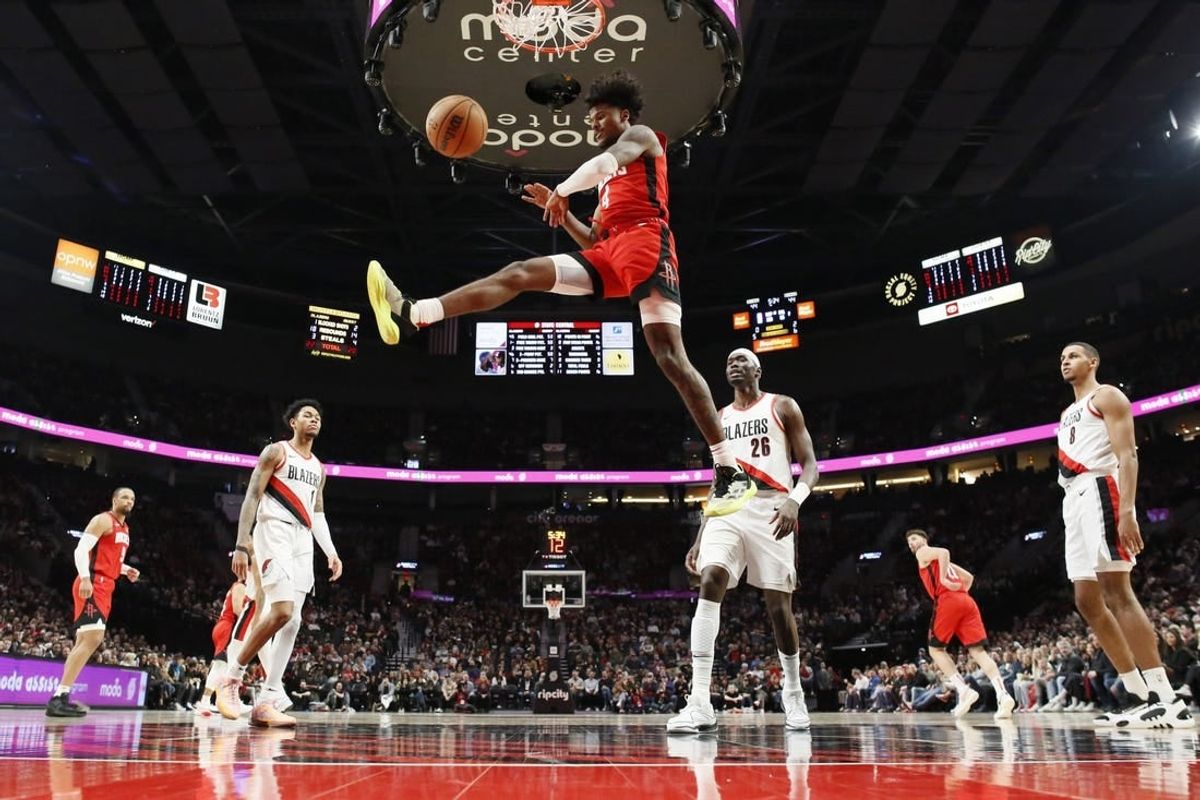 Mar 8, 2024; Portland, Oregon, USA; Houston Rockets shooting guard Jalen Green (4) dunks the ball during the first half against the Portland Trail Blazers at Moda Center.