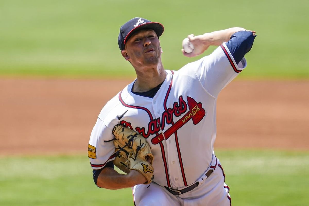 Jun 28, 2023; Cumberland, Georgia, USA; Atlanta Braves starting pitcher Kolby Allard (49) pitches against the Minnesota Twins during the first inning at Truist Park.