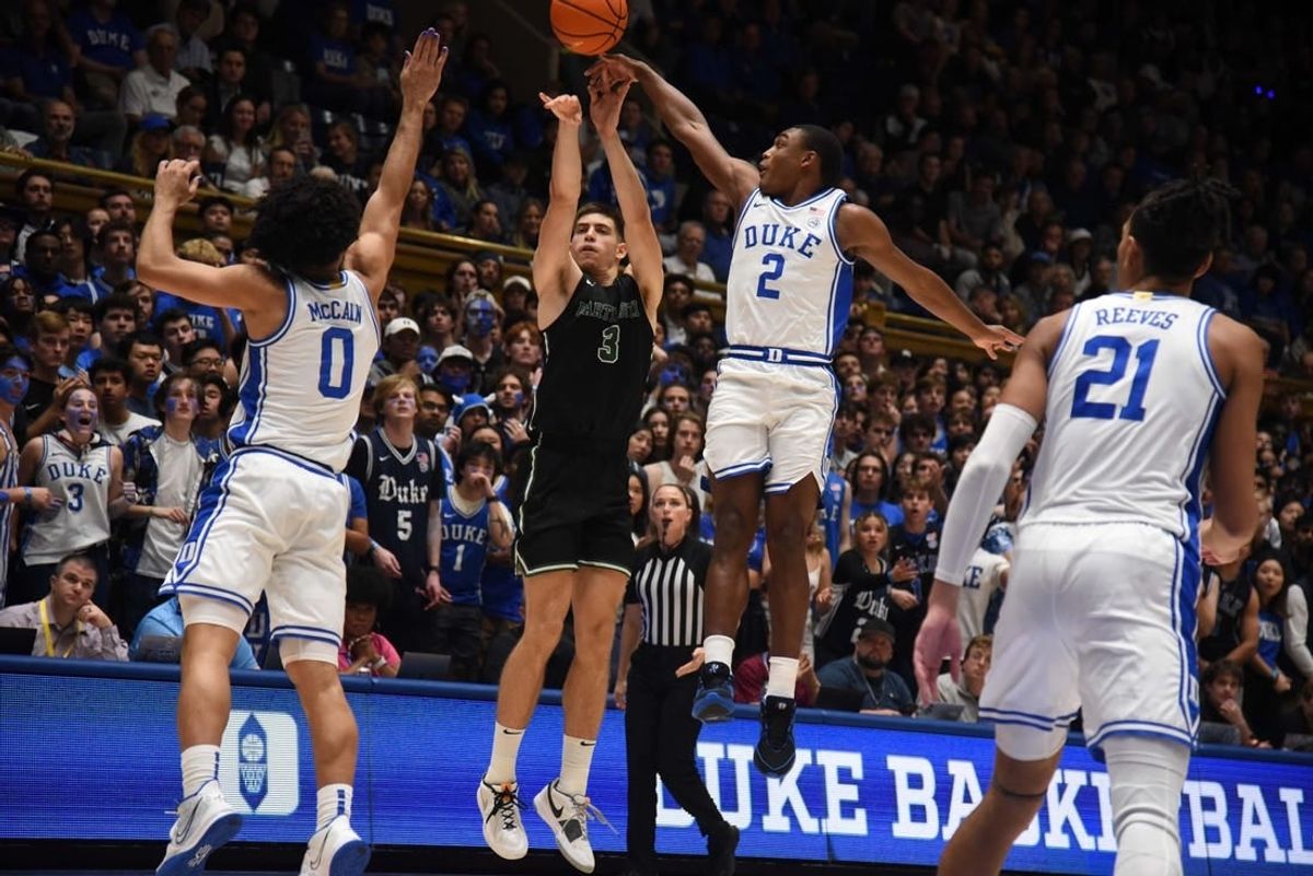 Nov 6, 2023; Durham, North Carolina, USA; Duke Blue Devils guard Jaylen Blakes (2) blocks the shot of Dartmouth Big Green forward Dusan Neskovic (3) during the first half at Cameron Indoor Stadium.