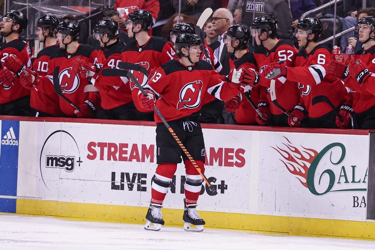 Jan 22, 2024; Newark, New Jersey, USA; New Jersey Devils center Nico Hischier (13) celebrates his goal with teammates during the second period against the Vegas Golden Knights at Prudential Center.