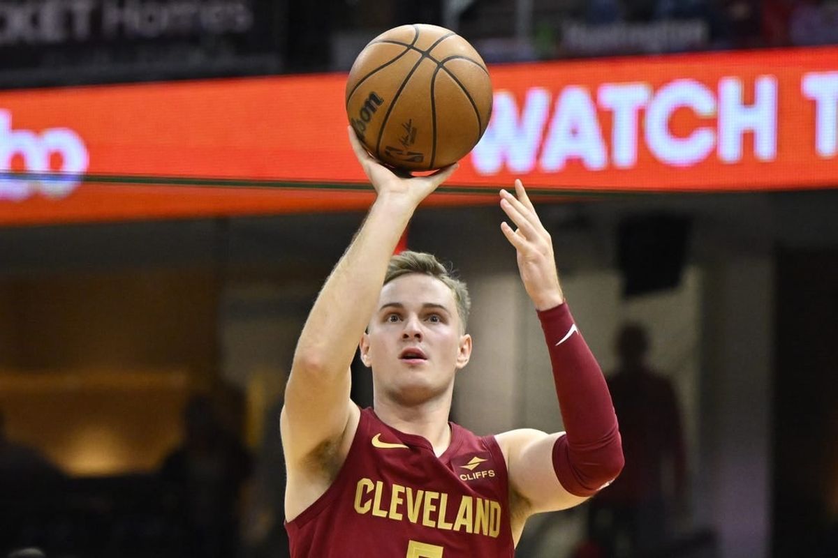 Nov 19, 2023; Cleveland, Ohio, USA; Cleveland Cavaliers guard Sam Merrill (5) shoots in the fourth quarter against the Denver Nuggets at Rocket Mortgage FieldHouse.