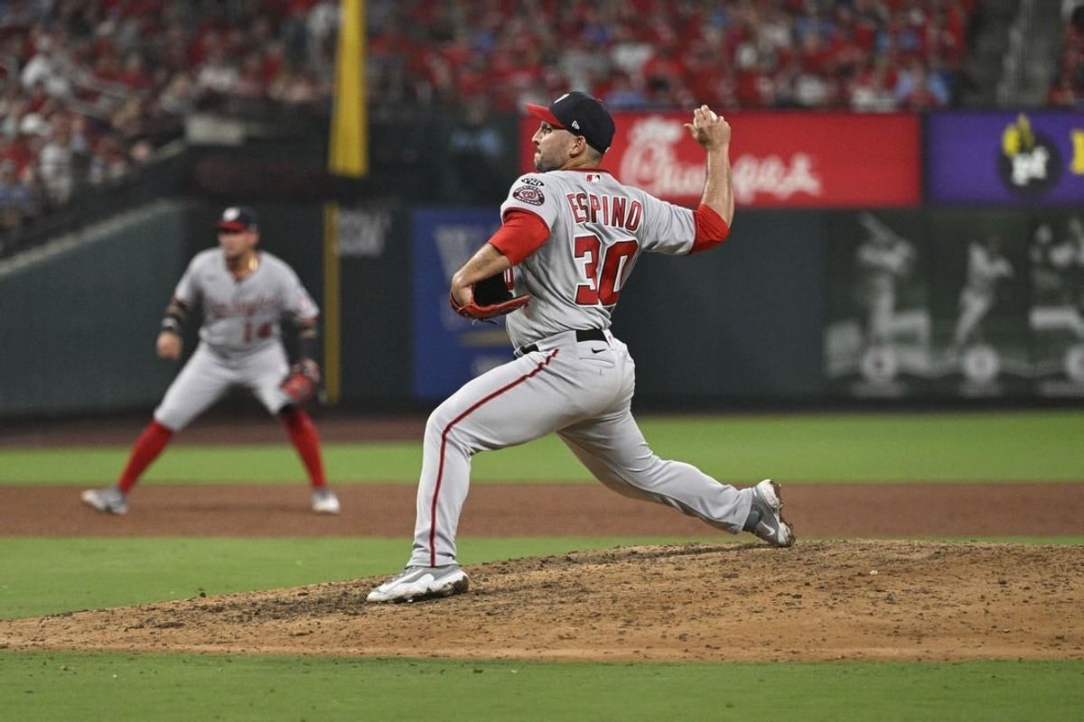 Jul 15, 2023; St. Louis, Missouri, USA; Washington Nationals relief pitcher Paolo Espino (30) throws against the St. Louis Cardinals during the sixth inning in game 2 of a double header at Busch Stadium.