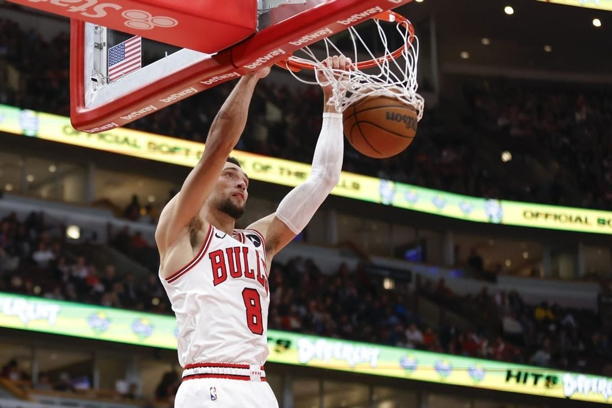 Nov 12, 2023; Chicago, Illinois, USA; Chicago Bulls guard Zach LaVine (8) scores against the Detroit Pistons during the second half at United Center.