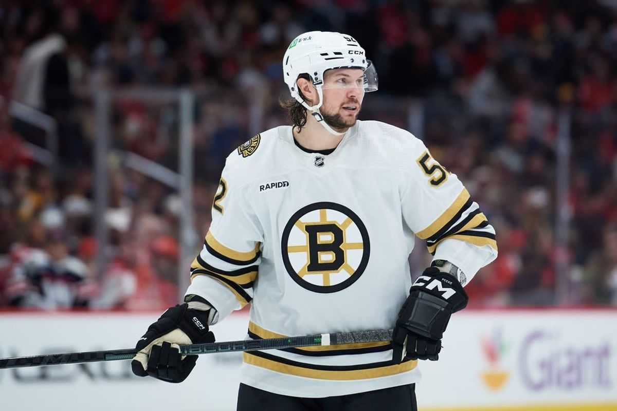 Mar 30, 2024; Washington, District of Columbia, USA; Boston Bruins defenseman Andrew Peeke (52) prepares for a face-off against the Washington Capitals during the second period at Capital One Arena.