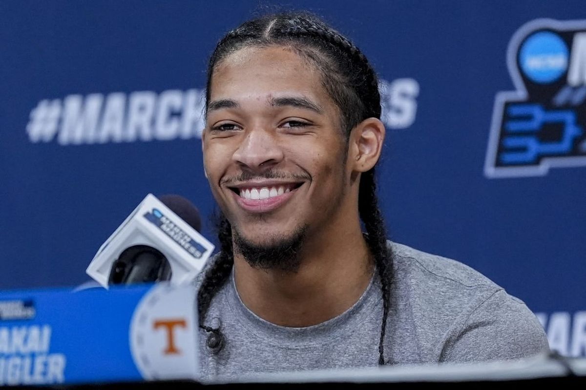 Mar 20, 2024; Charlotte, NC, USA; Tennessee Volunteers guard Zakai Zeigler (5) answers questions from the media during the NCAA first round practice session at Spectrum Center.