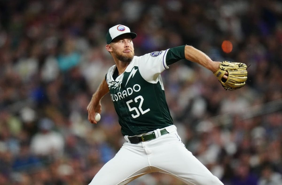 Jul 1, 2023; Denver, Colorado, USA; Colorado Rockies relief pitcher Daniel Bard (52) delivers a pitch in the ninth inning against the Detroit Tigers at Coors Field.