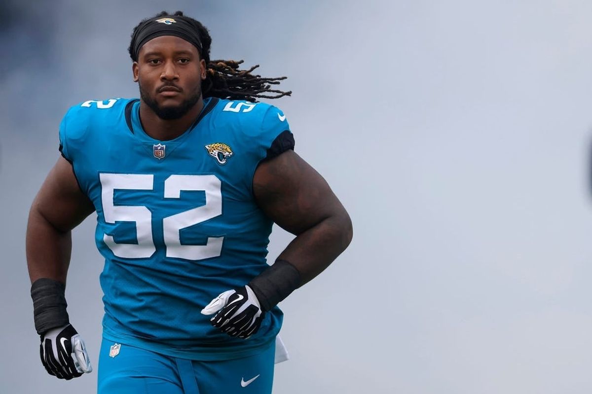 Jacksonville Jaguars defensive tackle DaVon Hamilton (52) takes to the field before a regular season NFL football matchup Sunday, Nov. 6, 2022 at TIAA Bank Field in Jacksonville. The Jacksonville Jaguars held off the Las Vegas Raiders 27-20. [Corey Perrine/Florida Times-Union]

Jki 110622 Raiders Jags Cp 107