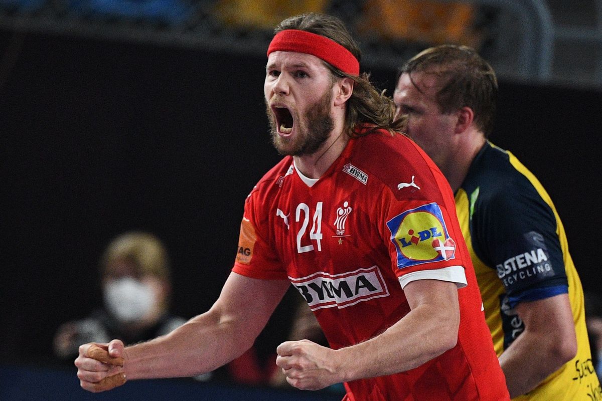 Denmark’s left back Mikkel Hansen celebrates a goal during the 2021 World Men’s Handball Championship final match between Denmark and Sweden.