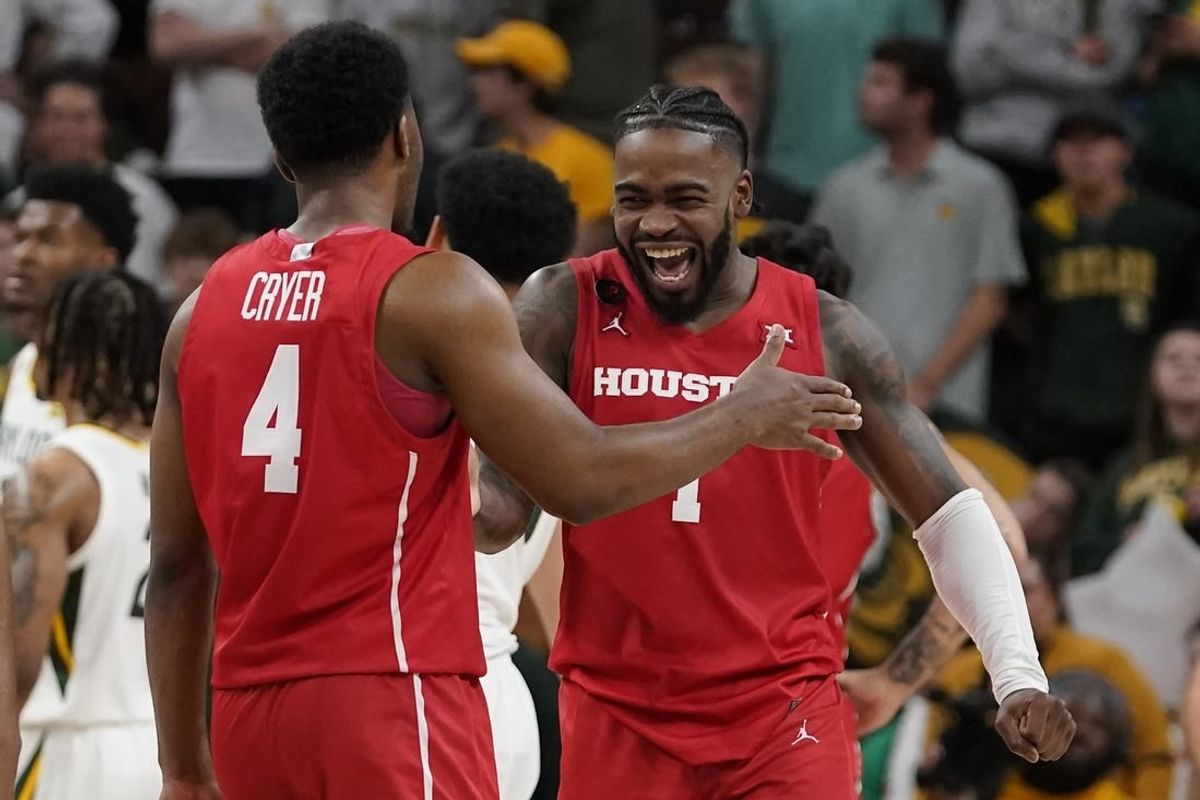 Feb 24, 2024; Waco, Texas, USA; Houston Cougars guard L.J. Cryer (4) and guard Jamal Shead (1) react in the closing moments of overtime against the Baylor Bears at Paul and Alejandra Foster Pavilion.