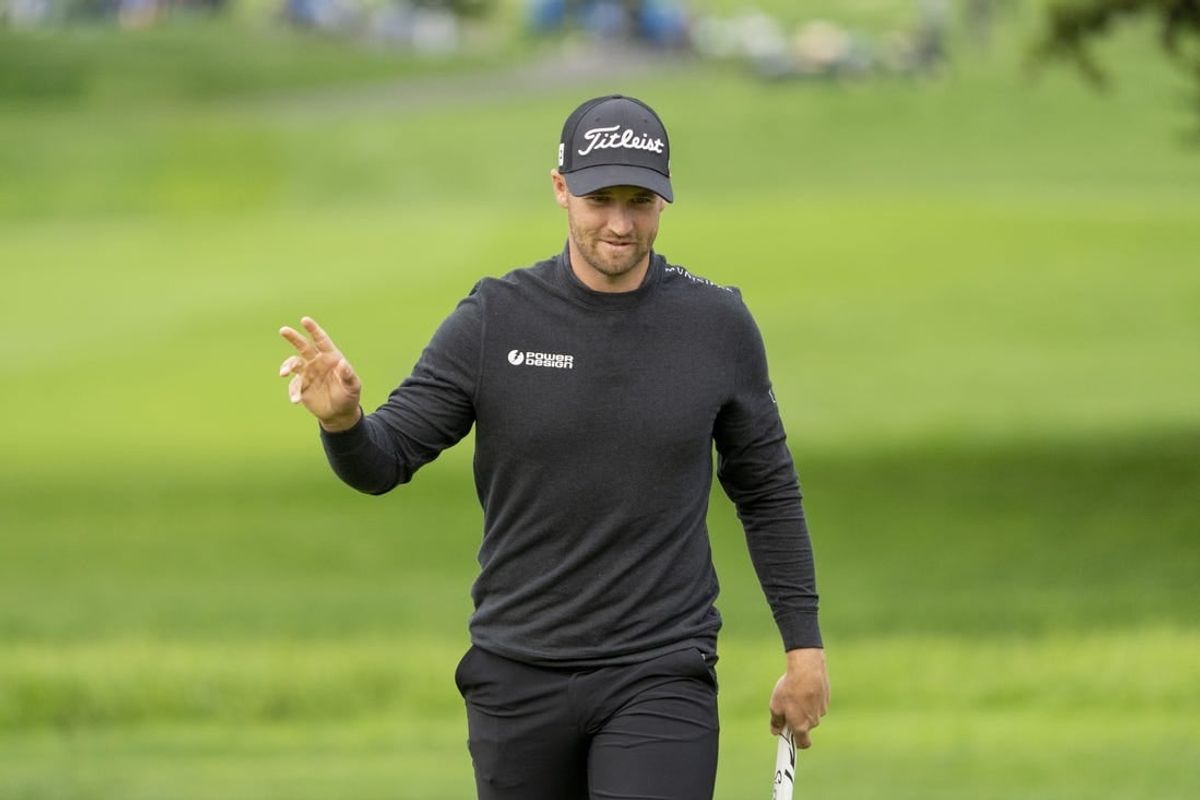 February 3, 2024; Pebble Beach, California, USA; Wyndham Clark acknowledges the crowd after making his putt on the second hole during the third round of the AT&T Pebble Beach Pro-Am golf tournament at Pebble Beach Golf Links.
