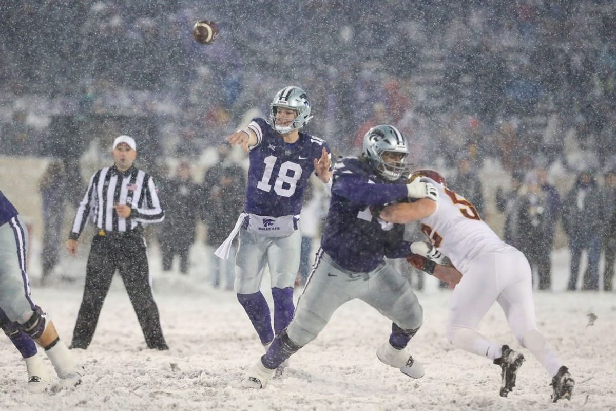 Nov 25, 2023; Manhattan, Kansas, USA; Kansas State Wildcats quarterback Will Howard (18) passes the ball during the fourth quarter against the Iowa State Cyclones at Bill Snyder Family Football Stadium.