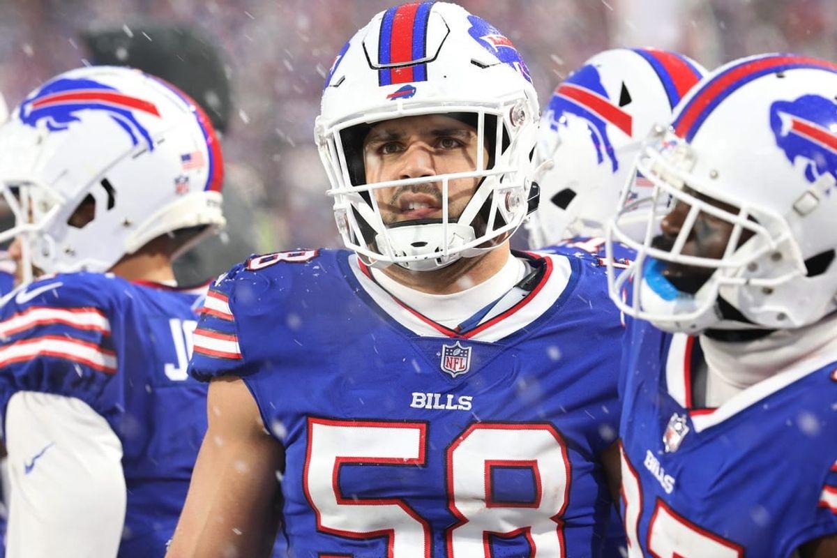 Buffalo Bills Matt Milano makes a face as he watches the action on the large screen hanging over the field.  The Bills hosted the Cincinnati Bengals in their division playoff game and lost, Jan. 22, 2023.

Bills Matt Milano