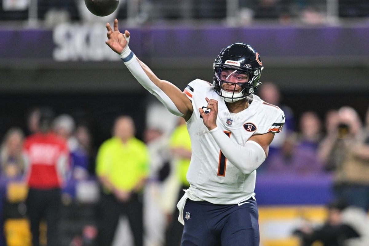 Nov 27, 2023; Minneapolis, Minnesota, USA; Chicago Bears quarterback Justin Fields (1) throws a pass during the game against the Minnesota Vikings at U.S. Bank Stadium.