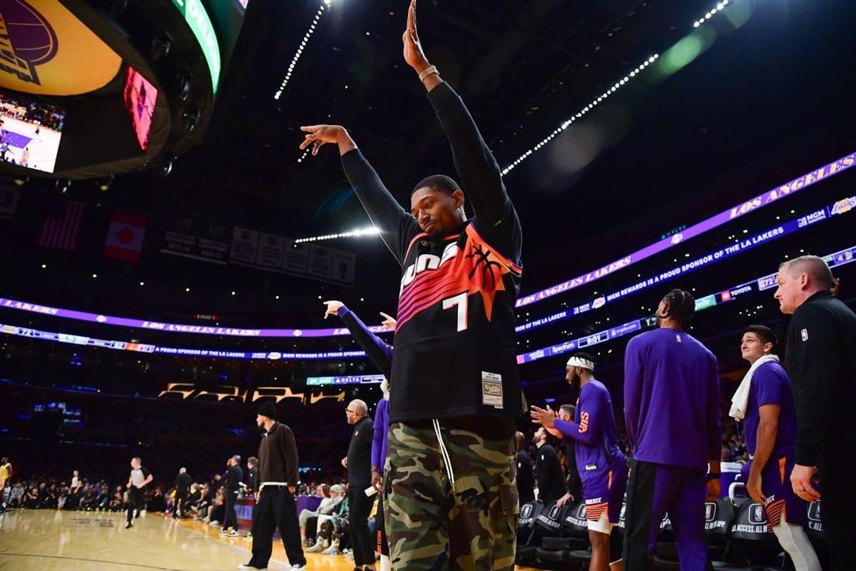 Oct 26, 2023; Los Angeles, California, USA; Phoenix Suns guard Bradley Beal (3) reacts after forward Kevin Durant (35) scores a three point basket against the Los Angeles Lakers during the second half at Crypto.com Arena.
