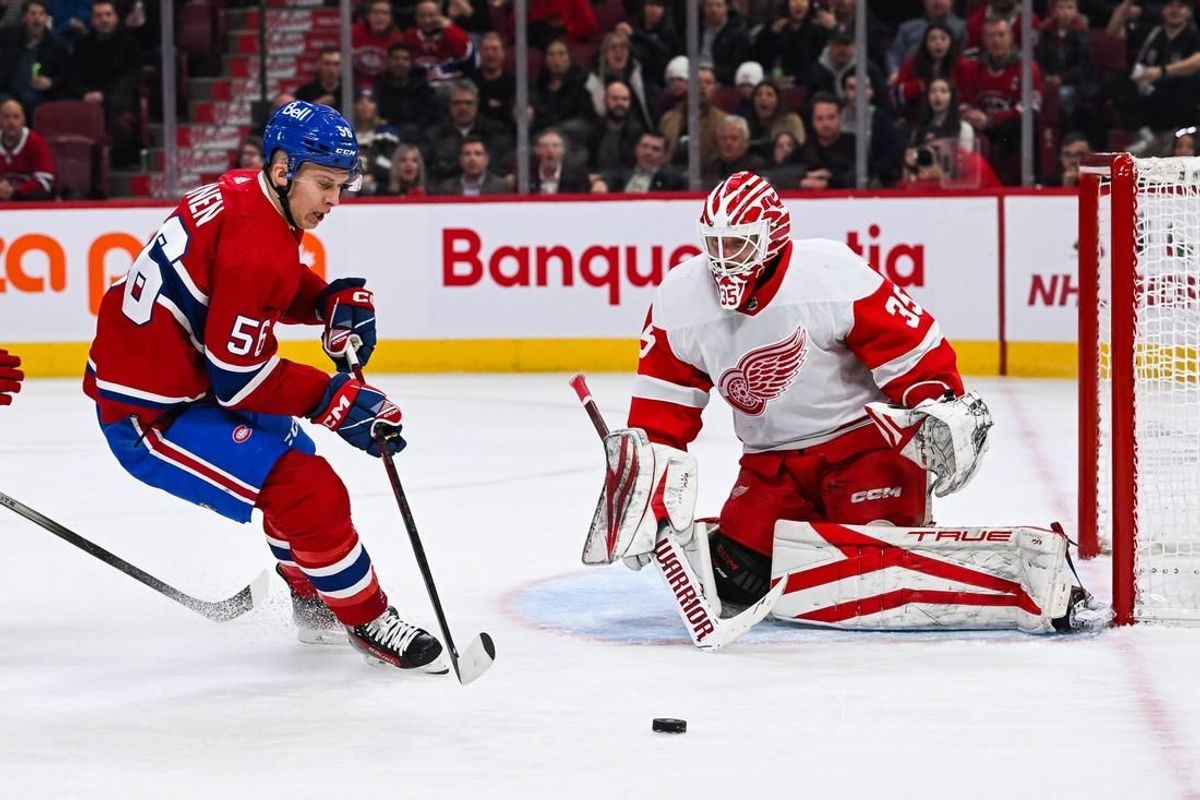 Dec 2, 2023; Montreal, Quebec, CAN; Montreal Canadiens right wing Jesse Ylonen (56) misses his shot against Detroit Red Wings goalie Ville Husso (35) during the first period at Bell Centre.