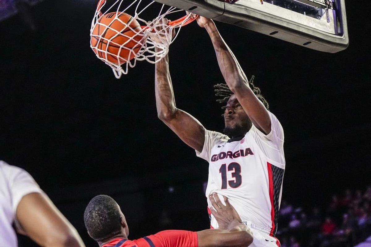 Mar 5, 2024; Athens, Georgia, USA; Georgia Bulldogs forward Dylan James (13) dunks against the Mississippi Rebels during the first half at Stegeman Coliseum.